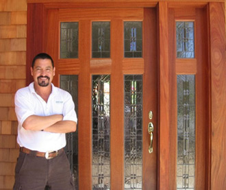 Genaro with a newly installed entryway window