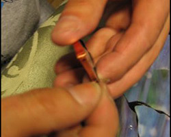 Wrapping the pieces with copper foil tape