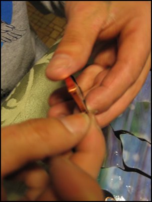Wrapping the pieces with copper foil tape